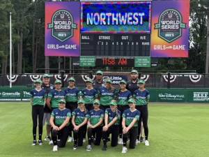 The Mill Creek Little League All-Star softball team poses at Stallings Stadium in Greenville N.C. as it prepared to open the Little League World Series. (Photo courtesty of Mill Creek Little League)