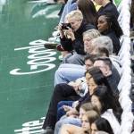 Seattle Reign and UWSNT star Megan Rapinoe takes photos courtside during the game on Tuesday, Aug. 5, 2025 in Seattle, Washington. (Olivia Vanni / The Herald)