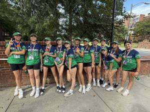 The Mill Creek Little League All-Star softball team gathers for a photo prior to the Little League World Series opening ceremonies on Saturday, August 2, 2025 in Greenville, N.C. (Photo courtesy of Jamie Miller)