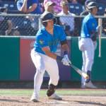 AquaSox infielder Brandon Eike watches the ball off his bat during Everetts 7-4 loss to the Spokane Indians at Funko Field on July 27, 2025. (Joe Pohoryles / The Herald)