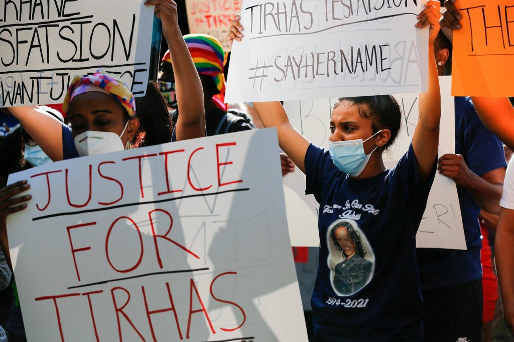 Family members gather in the quest for answers in the death of Tirhas Tesfatsion on July 13 during a protest rally Monday afternoon at the Lynnwood City Hall on July 26, 2021. (Kevin Clark / The Herald)
