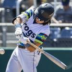 Everett AquaSox outfielder Tai Peete gets a hit during the game against the Spokane Indians on Thursday, July 24, 2025 in Everett, Washington. (Olivia Vanni / The Herald)