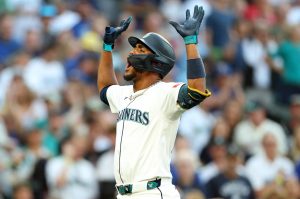 Julio Rodríguez of the Seattle Mariners reacts after his solo home run during the third inning against the Tampa Bay Rays at T-Mobile Park on Saturday, Aug. 9, 2025, in Seattle. (Steph Chambers / Getty Images / Tribune News Services)