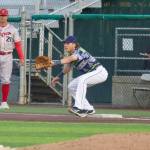 AquaSox infielder Carter Dorighi readies his glove to receive a put out at first base during Everett's 7-1 win against the Spokane Indians at Funko Field on July 25, 2025. (Joe Pohoryles / The Herald)