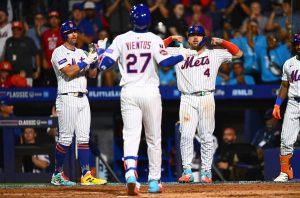 Mark Vientos (27) of the New York Mets celebrates his three-run home run with Jeff McNeil (1) and Francisco Alvarez in the fifth inning against the Seattle Mariners during the MLB Little League Classic at Bowman Field on Sunday, Aug. 17, 2025, in South Williamsport, Pennsylvania. (Joe Sargent / Getty Images / Tribune News Services)
