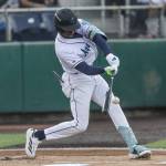 Everett AquaSox infielder Felnin Celesten makes contact with the ball during an at bat during the game against the Spokane Indians on Tuesday, Aug. 19, 2025 in Everett, Washington. (Olivia Vanni / The Herald)