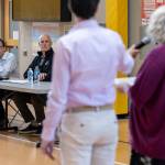 Community leaders address Gov. Bob Ferguson and Rep. Rick Larsen talk during a listening session at Lynnwood Elementary School on Thursday, Aug. 21, 2025 in Lynnwood, Washington. (Olivia Vanni / The Herald)