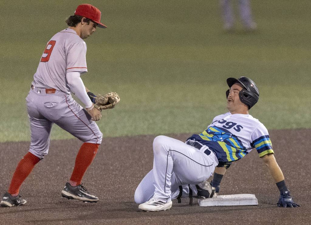 Everett AquaSox catcher Matthew Ellis smiles after almost sliding off of second base during the game against the Spokane Indians on Wednesday, Aug. 20, 2025 in Everett, Washington. (Olivia Vanni / The Herald)