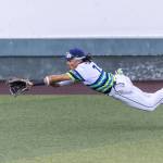 Everett AquaSox outfielder Tai Peete dives for a ball in the outfield during the game against the Spokane Indians on Wednesday, Aug. 20, 2025 in Everett, Washington. (Olivia Vanni / The Herald)
