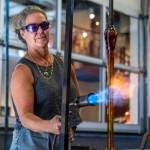Merrilee Moore works with glass at Schack Art Center in Everett, Washington on Friday, Sept. 15, 2023. (Annie Barker / The Herald)