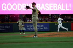 Eugenio Suárez of the Seattle Mariners celebrates his three-run home run against San Diego Padres pitcher Jason Adam (40) during the fifth inning at T-Mobile Park on Tuesday, Aug. 26, 2025, in Seattle. (Steph Chambers / Getty Images / Tribune News Services)