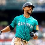 Seattle Mariners center fielder Julio Rodriguez (44) hits a home run during a game between the Detroit Tigers and Seattle Mariners at Comerica Park in Detroit, Michigan, on Saturday, July 12, 2025. (Devin Anderson-Torrez / mlive.com / Tribune News Services)