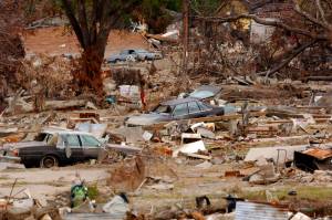 FILE — Destroyed homes and cars in the Lower Ninth Ward after Hurricane Katrina, in New Orleans, Nov. 7, 2005. In New Orleans, low-income homeowners are at risk of losing houses built by Habitat for Humanity as more storms hit the city and property insurance prices soar. (Robert Caplin/The New York Times)