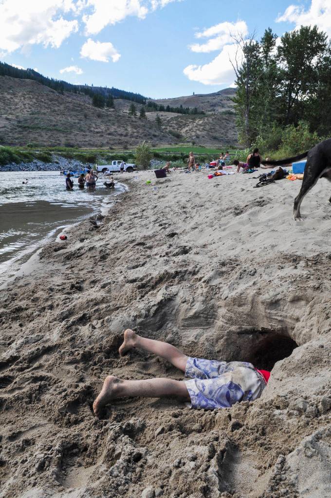 Folks come from far and near to enjoy the beach at the Carlton swimming hole. (Sue Misao)