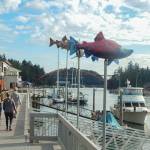 Artwork is found throughout La Conner, including along its channel boardwalk. (Jon Bauer / The Herald)