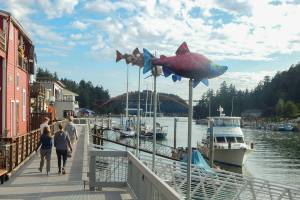 Artwork is found throughout La Conner, including along its channel boardwalk. (Jon Bauer / The Herald)