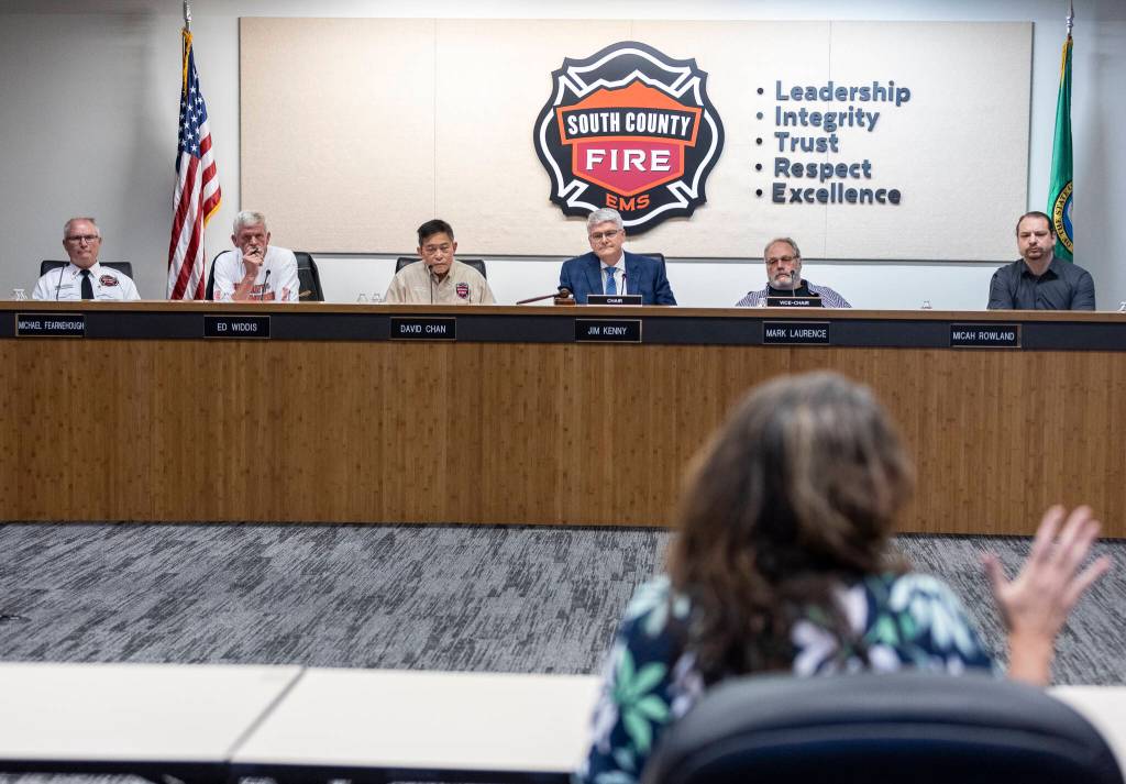The South County Fire Board of Commissioners listen as people voice their concerns on staff at Station 76 in Mill Creek on Tuesday, Sept. 2, 2025, in Everett, Washington. (Olivia Vanni / The Herald)