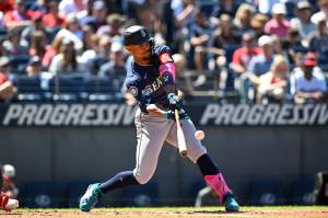 Julio Rodríguez (44) of the Seattle Mariners hits a single during the third inning against the Cleveland Guardians at Progressive Field on Aug. 31, 2025, in Cleveland, Ohio. (Nick Cammett / Getty Images / Tribune News Services)