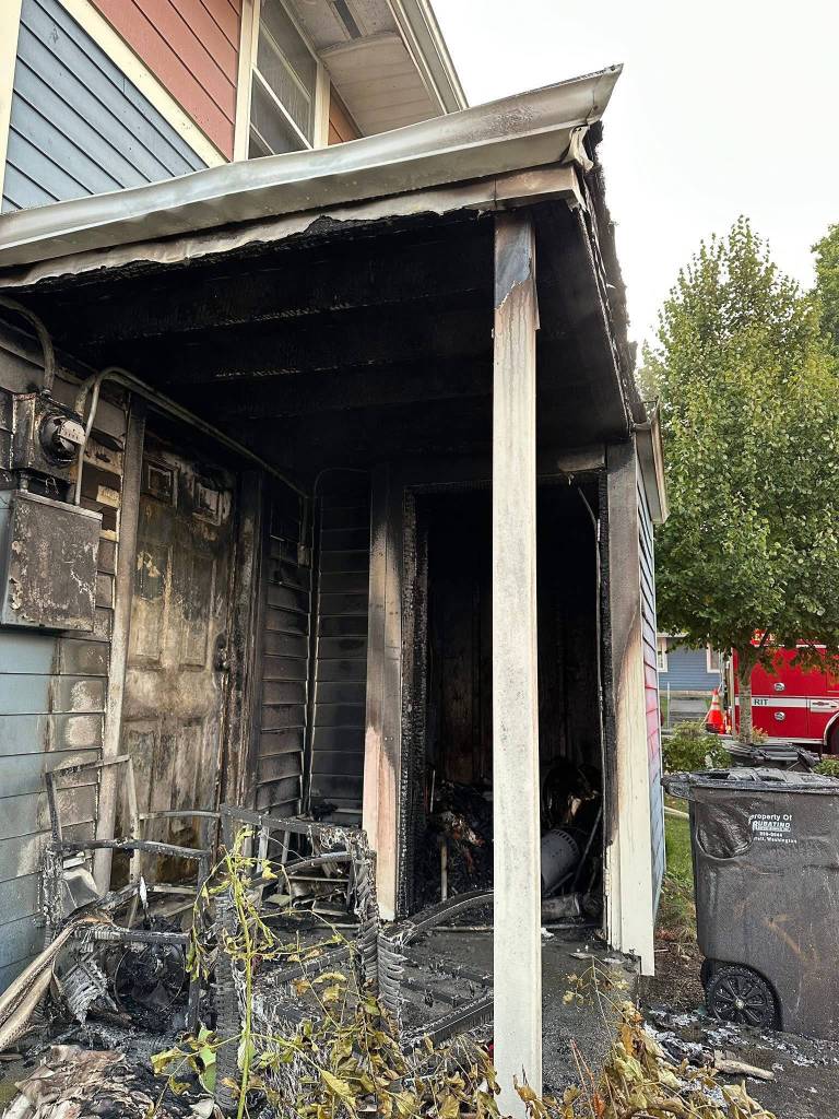 Firefighters responded Wednesday to reports of smoke and flames on the back side of a duplex on Linden Street in Everett. (Everett Fire Department)
