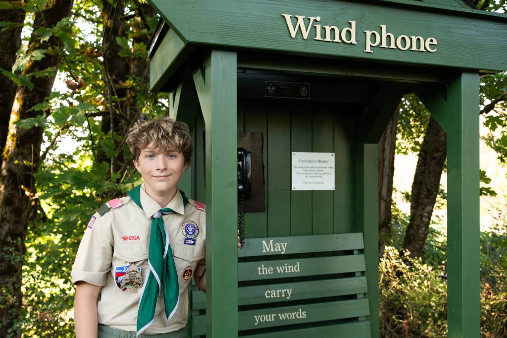 photos by Will Geschke / The Herald 
Michael Powers, 15, stands with his wind phone project on Friday in Arlington.