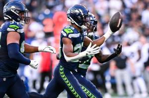 Seahawks cornerback Josh Jobe (29) celebrates his interception with teammates in a preseason game against the Las Vegas Raiders on Aug. 7, 2025 at Lumen Field in Seattle, Washington. (Photo courtesy of the Seattle Seahawks)