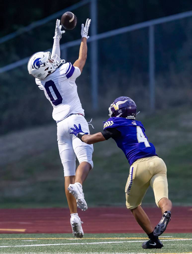 Lake Stevens Seth Price tries to push Sumners Braylon Pope out of bounds as he makes a catch in the end zone for a touchdown during the game against Sumner on Friday, Sept. 5, 2025 in Lake Stevens, Washington. (Olivia Vanni / The Herald)