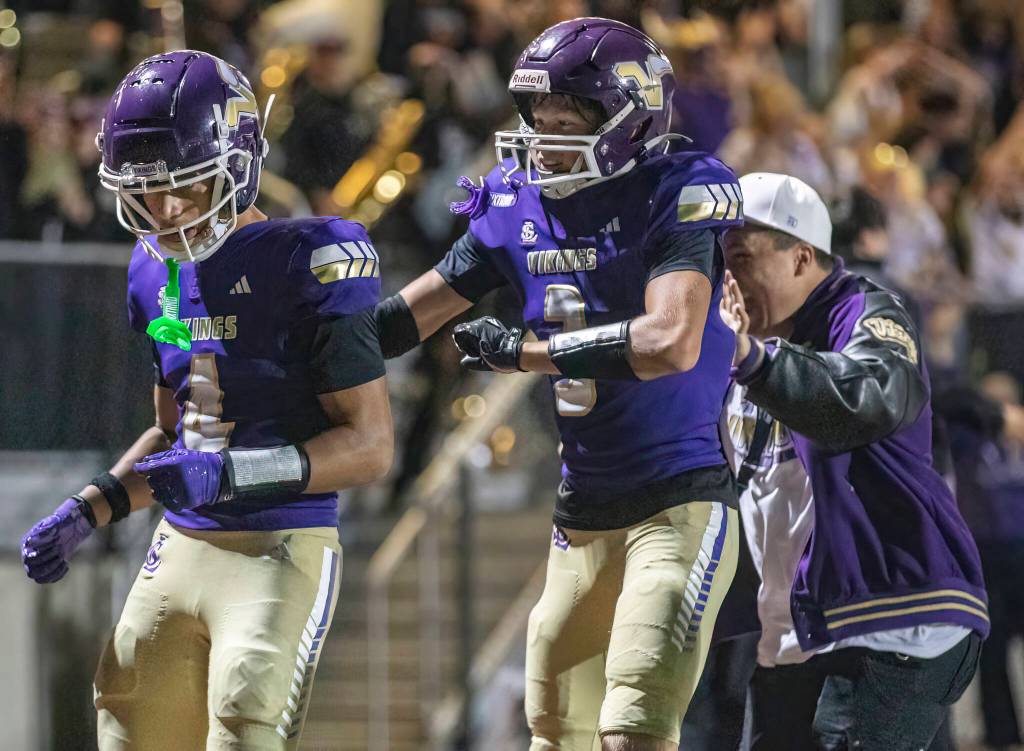 Lake Stevens Seth Price celebrates after scoring the game-winning touchdown against Sumner on Friday, Sept. 5, 2025 in Lake Stevens, Washington. (Olivia Vanni / The Herald)