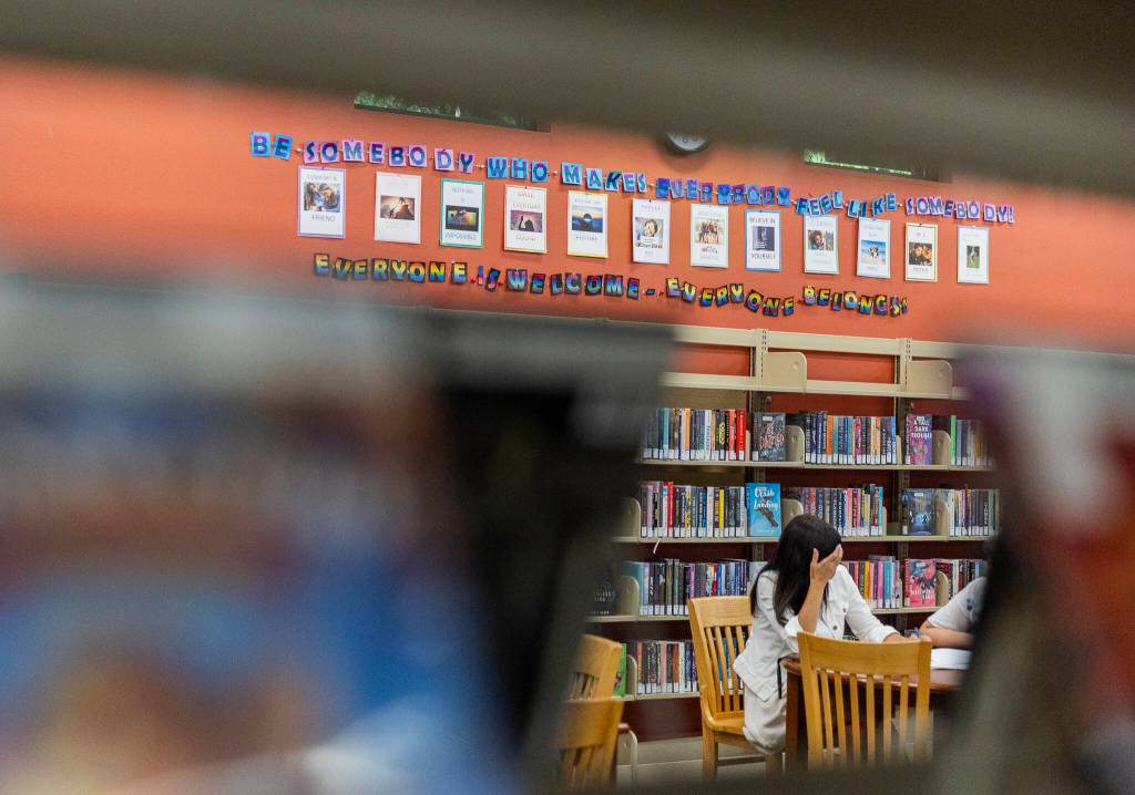 Students chat and study in the Teen section of the Mukilteo Library on Tuesday, Sept. 9, 2025 in Mukilteo, Washington. (Olivia Vanni / The Herald)