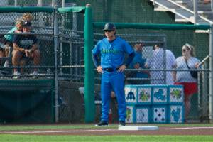 AquaSox manager Zach Vincej takes stands behind third base between innings during Everett's 7-5 win against Eugene at Funko Field on Aug. 31, 2025 (Joe Pohoryles / The Herald)