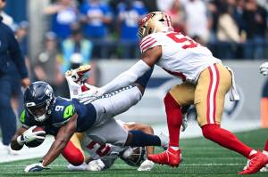 Seahawks running back Kenneth Walker II (9) is tackled during a loss to the San Francisco 49ers on Sunday, Sept. 7, 2025 at Lumen Field in Seattle, Washington. (Photo courtesy of the Seattle Seahawks)
