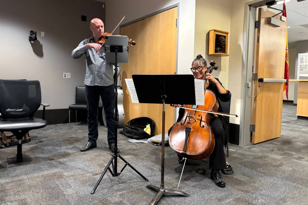 photos by Taylor Scott Richmond / The Herald 
Teo Benson (left) and Paula Madrigal (right) perform Mexican Overture by Merle J. Isaac during a Snohomish County Council general legislative session on Wednesday in Everett to celebrate Hispanic Heritage Month.