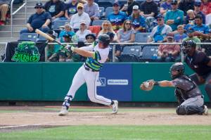 AquaSox outfielder Jonny Farmelo hits an RBI triple against the Eugene Emeralds in Game 3 of the 2025 Northwest League Championship Series at Funko Field on Sept. 12, 2025. (Joe Pohoryles / The Herald)