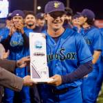 AquaSox manager Zach Vincej is presented the Northwest League Championship trophy following Everetts series-clinching 6-3 win in Game 4 against the Eugene Emeralds at Funko Field on Sept. 13, 2025. (Joe Pohoryles / The Herald)