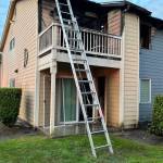 Firefighters responded Monday, Sep. 15, 2025, to reports of a woman trapped on the balcony of the Crystal Springs Apartments in Everett due to a fire on the west side of the building. (Everett Fire Department)
