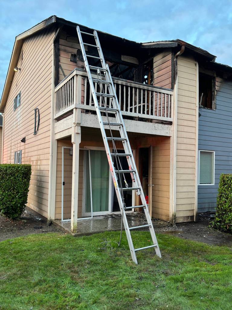 Firefighters responded Monday, Sep. 15, 2025, to reports of a woman trapped on the balcony of the Crystal Springs Apartments in Everett due to a fire on the west side of the building. (Everett Fire Department)