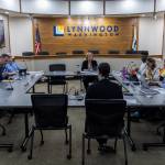 The Lynnwood City Council listens to a presentation by Finance Director Michelle Meyer during a city council meeting on on Monday, Sept. 15, 2025 in Lynnwood, Washington. (Olivia Vanni / The Herald)