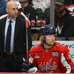 Capitals assistant coach Mitch Love, left, with defenseman Jakob Chychrun in November. (John McDonnell / For The Washington Post)