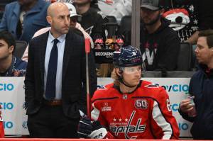 Capitals assistant coach Mitch Love, left, with defenseman Jakob Chychrun in November. (John McDonnell / For The Washington Post)