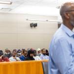 People fill the courtroom and listen as Abdi Shire speaks during the sentencing hearing for Alex Waggoner on Wednesday, Sept. 17, 2025, in Everett, Washington. (Olivia Vanni / The Herald)