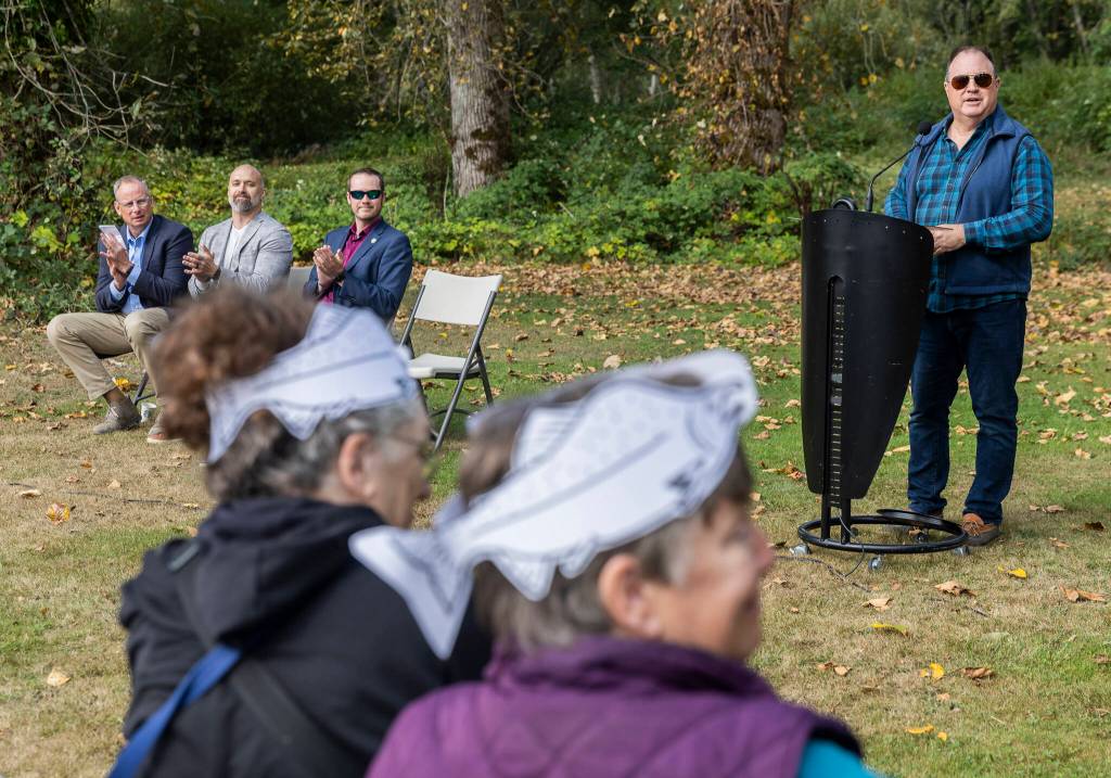 PUD Commissioner Sid Logan speaks at the ribbon cutting for a new channel at Osprey Park on Thursday, Sept. 18, 2025 in Sultan, Washington. (Olivia Vanni / The Herald)