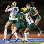 Shorecrests Olivia Taylor heads the ball on a corner kick during the game against Edmonds-Woodway on Sept. 23, 2025 in Shoreline, Washington. (Olivia Vanni / The Herald)