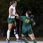 Edmonds-Woodways Magdalena Waters heads the ball above Shorecrests Summer Suleiman during the game on Sept. 23, 2025 in Shoreline, Washington. (Olivia Vanni / The Herald)