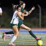 Shorecrests Sophia Tubbs and Edmonds-Woodways Jane Hanson battle for possession during the game on Sept. 23, 2025 in Shoreline, Washington. (Olivia Vanni / The Herald)