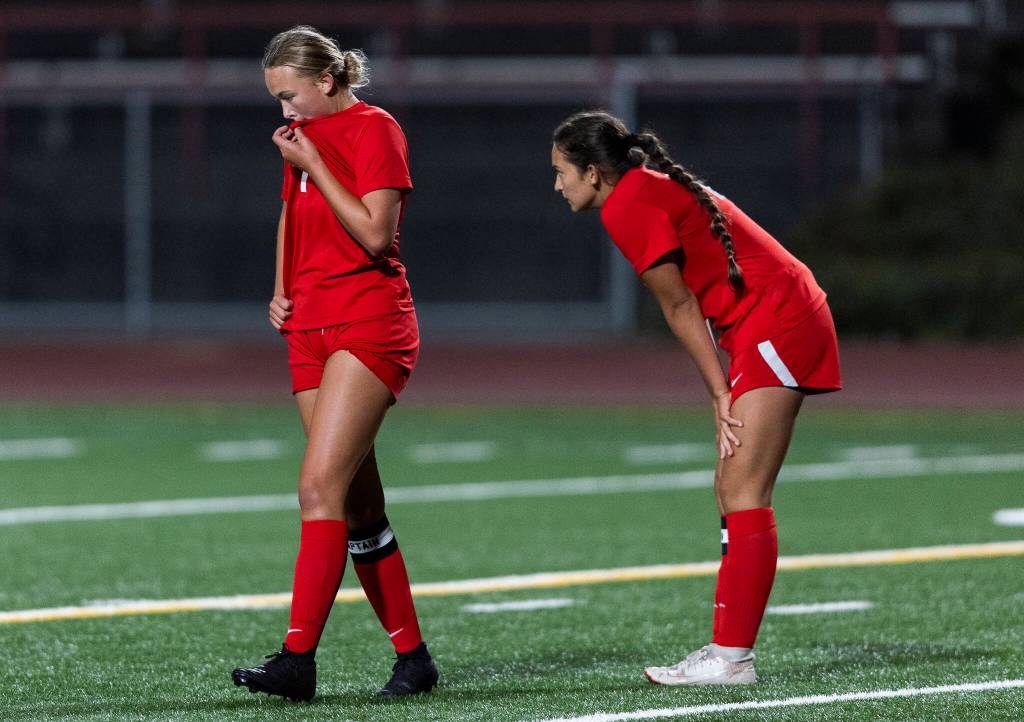 Stanwood players react to having a second goal scored on them during the game against Snohomish on Sept. 25, 2025 in Stanwood, Washington. (Olivia Vanni / The Herald)