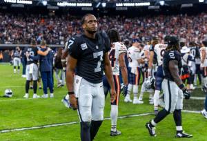 Raiders quarterback Geno Smith (7) unhappily walks off the field after a late loss to the Chicago Bears during the second half of their NFL game at Allegiant Stadium on Sunday, Sept. 28, 2025, in Las Vegas. (L.E. Baskow / Las Vegas Review-Journal / Tribune News Services)