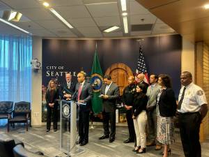 Washington state Attorney General Nick Brown speaks at a press conference alongside Seattle Mayor Bruce Harrell and other local officials on Monday, Sept. 29, 2025, at Seattle City Hall. (Photo by Jake Goldstein-Street/Washington State Standard)