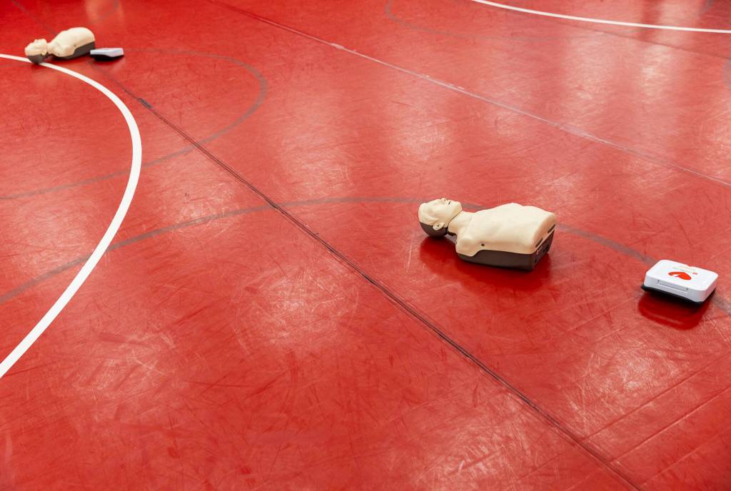 CPR dummies lie on the floor during Stanwood High Schools EKG Youth Heart Screening event on Oct. 1, 2025 in Stanwood, Washington. (Olivia Vanni / The Herald)