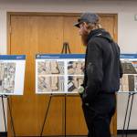 People looks at development plans for the Arlington Airport on Oct. 8, 2025 in Arlington, Washington. (Olivia Vanni / The Herald)