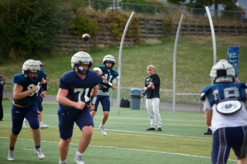 Glacier Peak sophomore Oliver Setterberg releases the ball during the Grizzlies practice at Glacier Peak High School in Snohomish on Sept. 30, 2025. (Joe Pohoryles / The Herald)