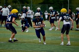 Glacier Peak senior Michael Darling (center) cuts down field after hauling in a reception during the Grizzlies' practice at Glacier Peak High School in Snohomish on Sept. 30, 2025. (Joe Pohoryles / The Herald)